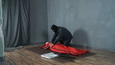 Bondage with red tourist bag with vibro and straps in vacuum bag