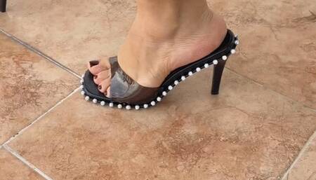 Goddess Barbara drinks coffee on the terrace while playing with her feet