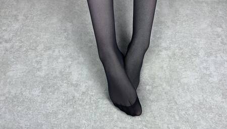 Mistress Caresses Her Feet in Black Nylon Pantyhose