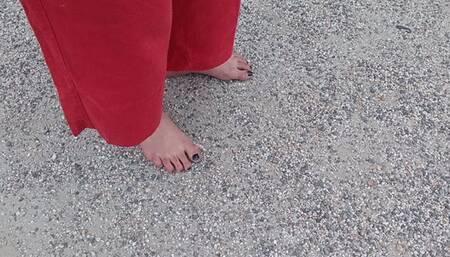Barefoot on old asphalt