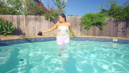 Tina takes a Dip in the Pool wearing all White
