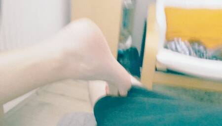 Quick footjob during conversation