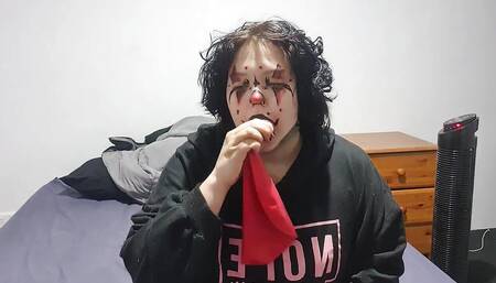 Clown Girl Blowing up and Popping Huge Balloon