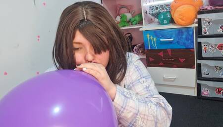 Girl Blowing up 3 Huge Balloons