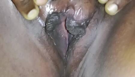 Tamil Chitra went to the bed room and sat down and stroked her gently and then quickly lowered her down and looked away