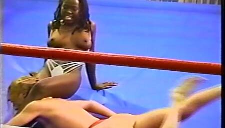 Interracial Pro Wrestling-Scissored, Kicked, Stomped, Kneed In The Crotch & Twisted Into The Ropes-Cathy vs Holly