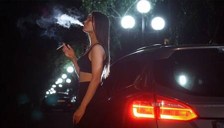 Smoking in the night outdoors