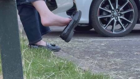 Candid shoeplay and dangling at the park