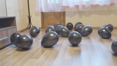 Black heels on black balloons