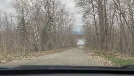 Car Stuck By The River