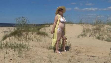 Mommy on the beach in a white bikini 3
