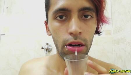 Filling a cup with spit and Jerking off