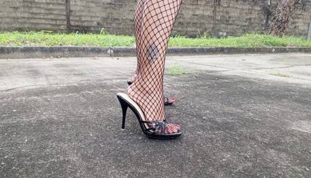 A goddess walking in high heels and fisherman's net stockings (3)
