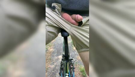 Young boy publicly flashing dick on the bike to strangers
