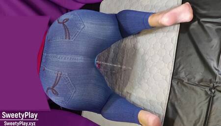 Big Ass in Jeans Peeing with Vibrator.