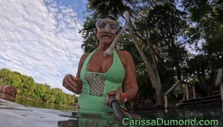 Springs lime green one piece with breast exposure