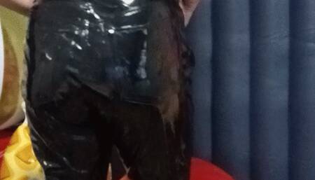 girl in latex and heels jumping on yoga ball