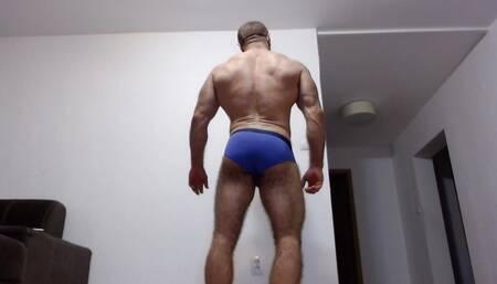 The Powerful Hairy Bodybuilder Does a Striptease, Poses, Dances and Shows a Hairy Hole in the Ass From Very Close up