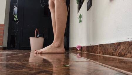 Katherine barefoot teasing while cleaning the house