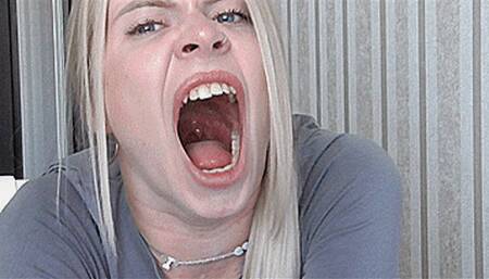 Sexy blonde yawns at her desk! MP4