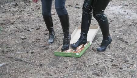 Two hot hotties in the woods crushing food with their heels