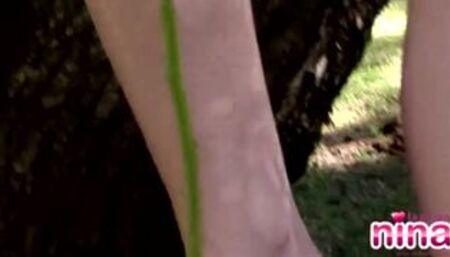 Booty babe teasing the camera outdoors