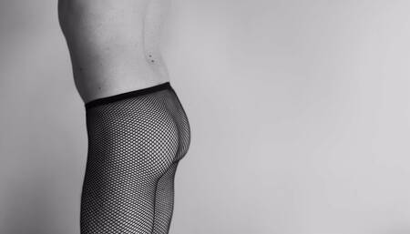Sexy teen boy dances with only fishnets tease