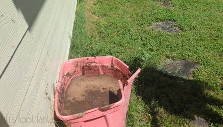 Fifi gets her black leather boots stuck in deep mud
