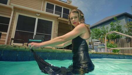Joy in the Pool Wearing a Sexy Black Satin Dress