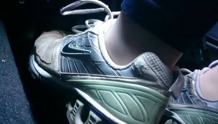 Driving on the coast in worn and broken Nike 1080HD