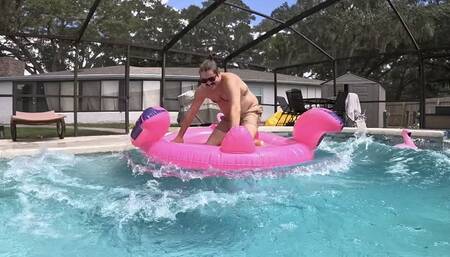 Theo Takes Down Inflatable Flamingo
