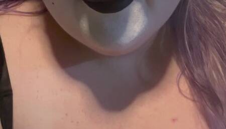 Lucky plays with her clown nose