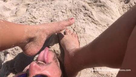 Buried in the sand beneath her feet and toes