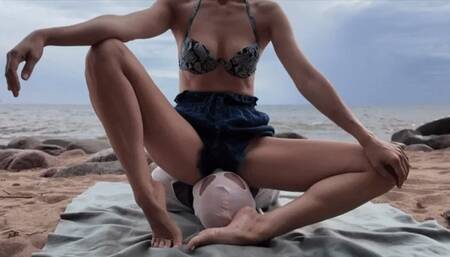 I breathe in the sea air, using the slave's face as a seat for my ass (Facesitting smothered)