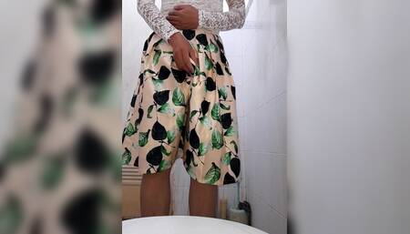 Urine and Sperm Flow Wetting the Satin Skirt of a Crossdresser
