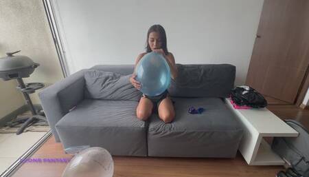 Akina blows balloons