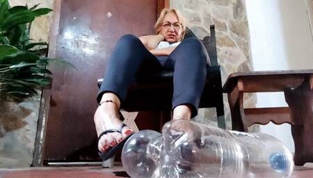 I crush and step on plastic bottles with my flip-flops and bare feet (1)