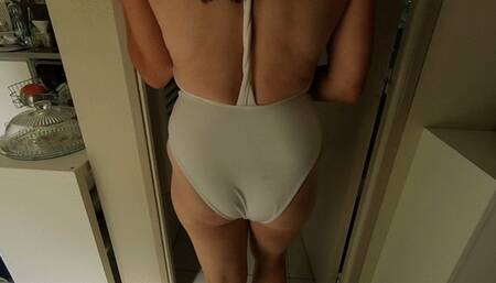 Showering in a bathing suit (2024) (MP4)