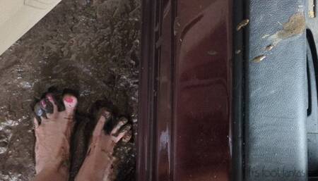 Fifi gets her sedan stuck in mud and desperately pumps the pedals with her muddy feet to try to get it going *new*