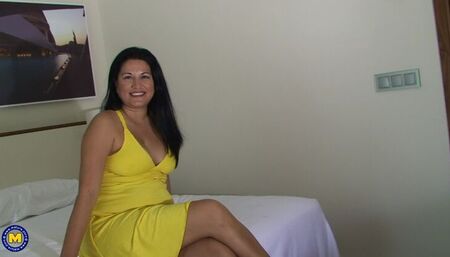 housewife playing with herself as a camera catches it all