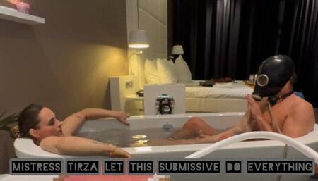 serving mistress tirza in bath her feet