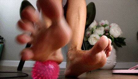 Foot play with pink ball