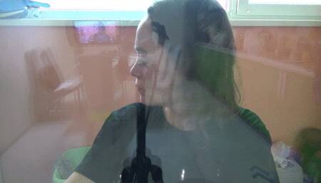 pushes me into the glass