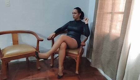 Cross-legged Alicia with dangling stiletto heels (2)