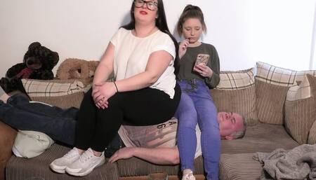 2 Girls Sit On The Guy