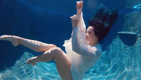 Raven Lynette Goes for a Swim in her Sheer White Dress