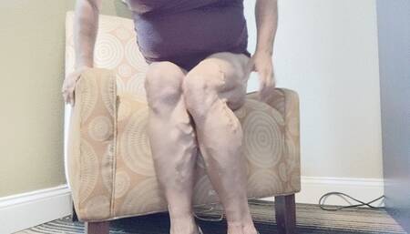 Tempest in purple swimsuit and heels