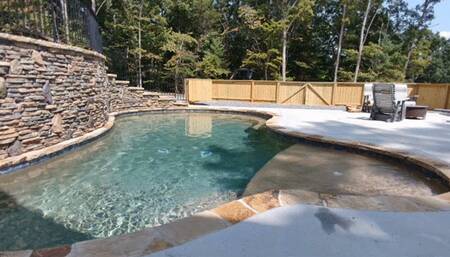 topless inflatable damsel in pool