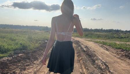 A girl in high-heeled shoes she makes her shoes dusty and dirty, she looks at them and finds it very sexy that they are now all dirty