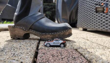 Sheet metal Cars under my cruel wooden Clogs